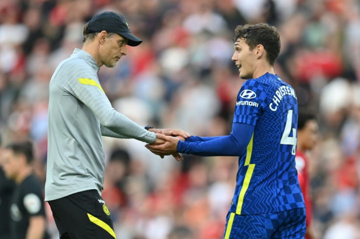 Thomas Tuchel (left)lauded Chelsea's resilience to hold out for a 1-1 draw at Liverpool with 10 men