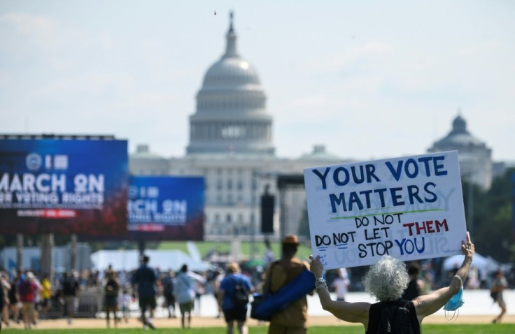 Protesters rally to demand protection for voting rights on the 58th anniversary of the 1963 March on Washington for Jobs and Freedom, in Washington, DC, on August 28, 2021
