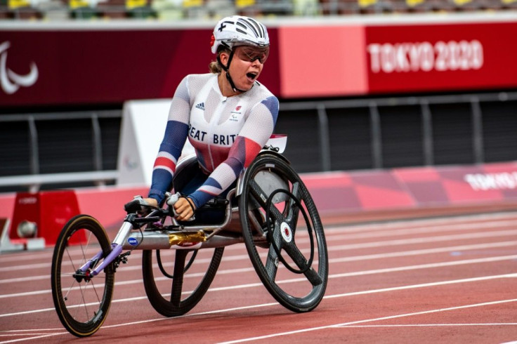 Britain's Hannah Cockroft reacts after winning gold in the women's 100m T34 final