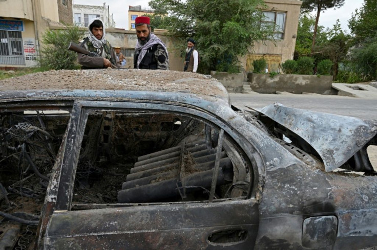 A rocket launcher system is visible in the back seat