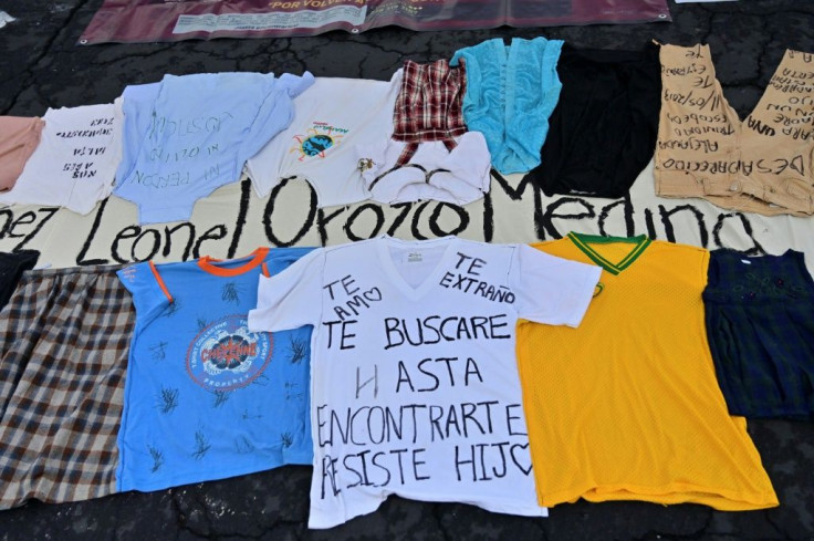 Families brought clothes of their missing loved ones to the demonstration