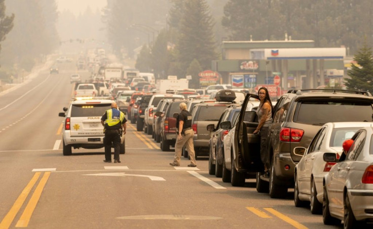 Roads out of South lake Tahoe are clogged as thousands of the city's residents heed orders to flee the approaching Caldor Fire