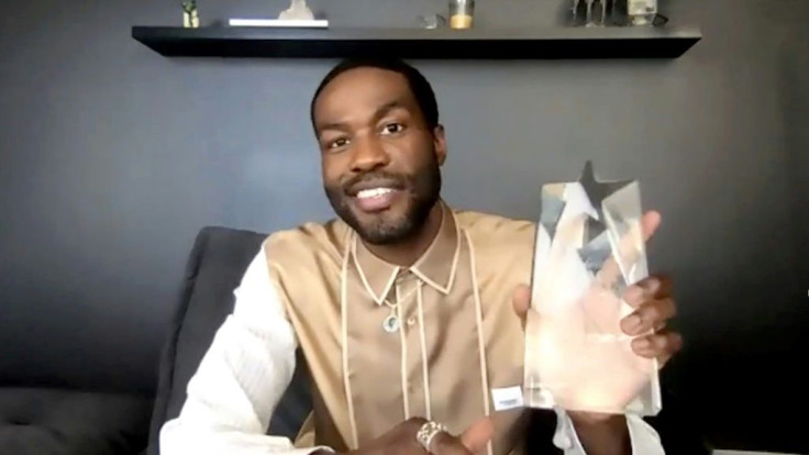 In this screengrab, Yahya Abdul-Mateen II accepts a Critics Choice award on February 2, 2021; he stars in box-office topping slasher film 'Candyman'
