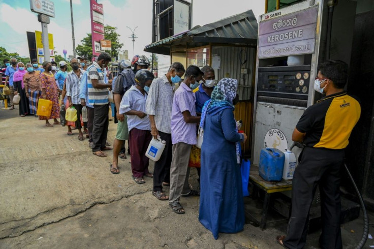 Shortages of goods including kerosene oil, milk and cooking gas have led to long queues forming outside stores in Sri Lanka