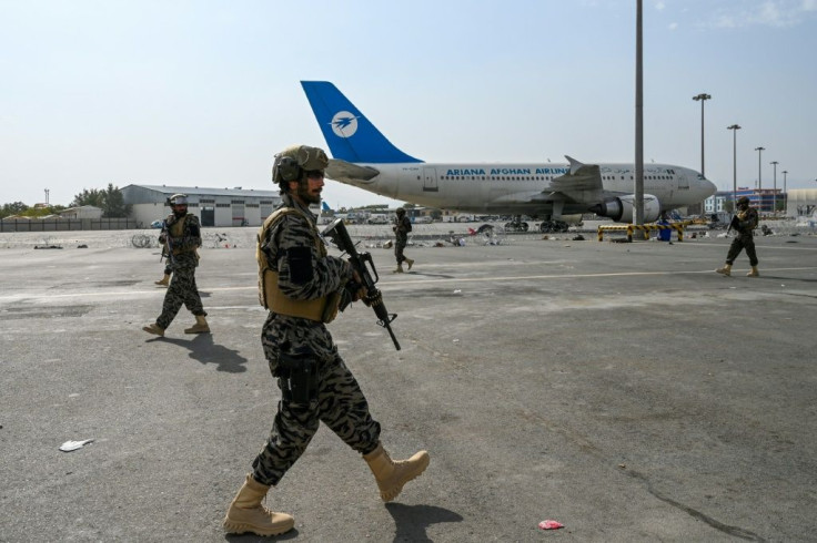 Taliban Badri special force fighters secure the airport in Kabul after the US' withdrawal