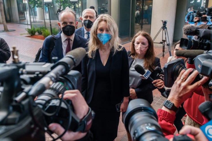 Elizabeth Holmes, the founder and former CEO of blood testing and life sciences company Theranos, arrives for the first day of jury selection in her fraud trial, outside Federal Court in San Jose, California on August 31