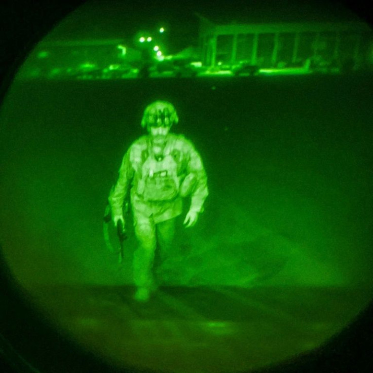 A US military handout image shows the final US service member boarding a flight out of Kabul