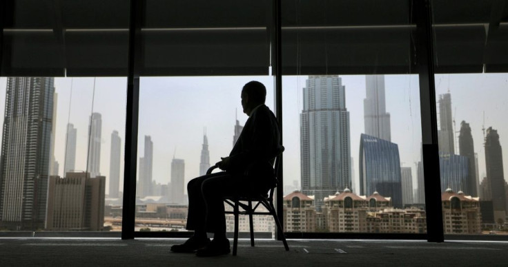 Ilan Sztulman Starosta, head of mission at Israel's consulate in Dubai, sits in his office against the background of the bustling Gulf city state