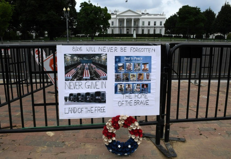 A makeshift memorial outside the White House for the 13 US troops killed in Afghanistan last week
