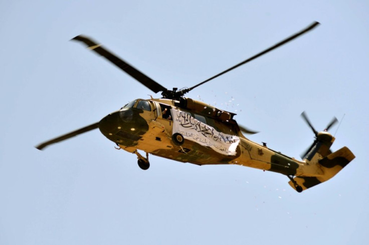 At least one Black Hawk helicopter buzzed overhead, suggesting someone from the former Afghan army was at the controls