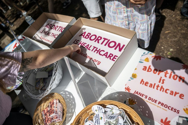Abortion rights signs are seen at a protest outside the Texas state capitol