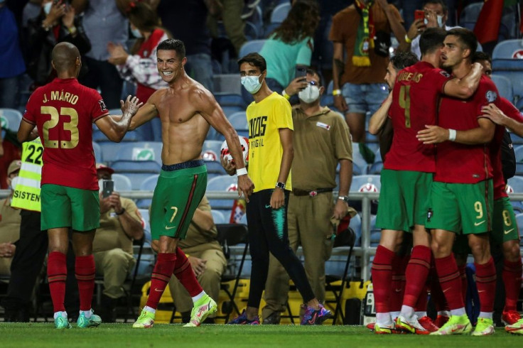 Cristiano Ronaldo (2ndL) scored twice late on to secure victory for Portugal over the Republic of Ireland