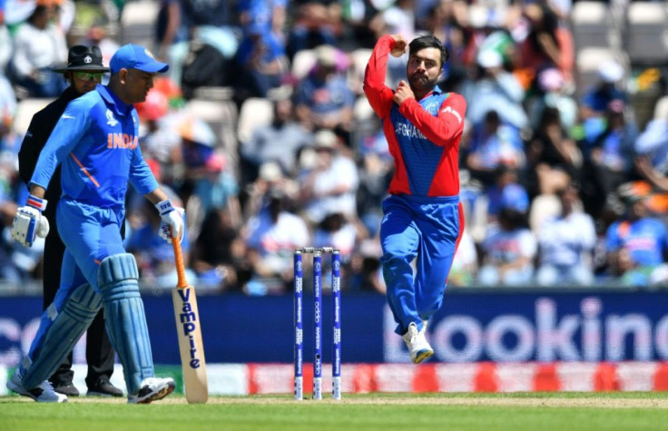 Afghanistan and star player Rashid Khan (right) will tour Australia after the Taliban gave their approval