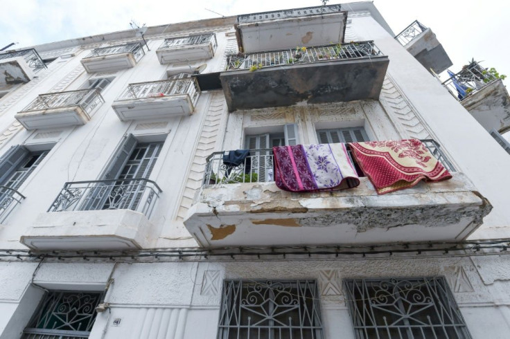 Built by Italian and French architects and businesspeople, decades-old buildings in the Tunisian capital bear the weight of their association with colonialism, with many neglected and turned into garbage dumps