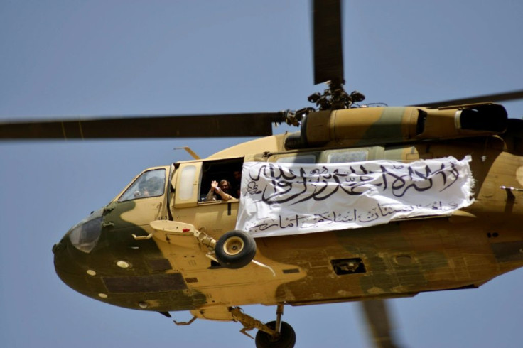 The Taliban flew a helicopter over Kandahar as they celebrated their victory