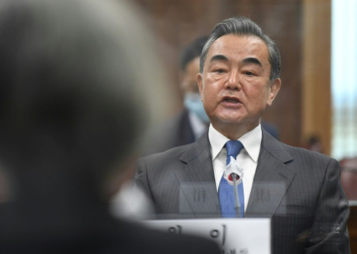 Chinese Foreign Minister Wang Yi has told US envoy John Kerry that any cooperation on climate could be hurt by wider discord in relations between Washington and Beijing