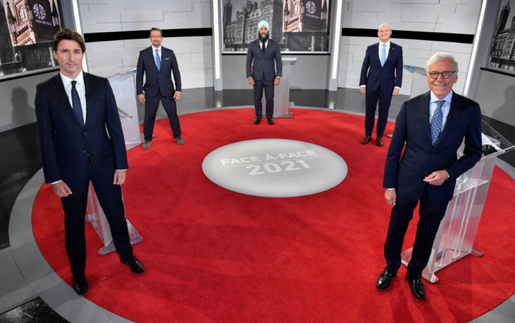 L to R: Prime Minister Justin Trudeau (L), Bloc Quebecois leader Yves-Francois Blanchet (2L), NDP leader Jagmeet Singh (C), Conservative leader Erin O'Toole (2R) and Canadian journalist Pierre Bruneau (R) at the TVA studios in Montreal on Sept 2, 2021