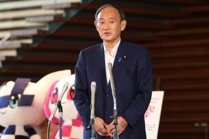 Japan's Prime Minister Yoshihide Suga said he realised that running for election and handling the virus response would require 'enormous energy'