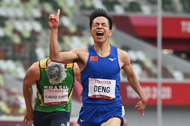 China's Deng Peicheng celebrates his win in the men's 100m (T36) athletics final on Saturday