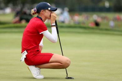 World number one Nelly Korda lines up a putt for the United States on the opening day of the Solheim Cup competition against Europe
