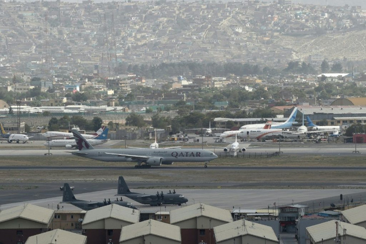 A Qatar Airways aircraft prepares for take off from Afghanistan's capital Kabul, a day before Taliban fighters entered the city