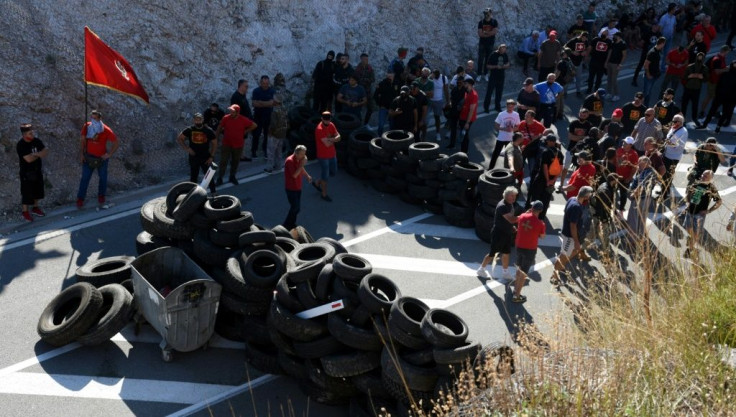 Opponents of the inauguration set up barricades on Saturday to block access roads to Cetinje