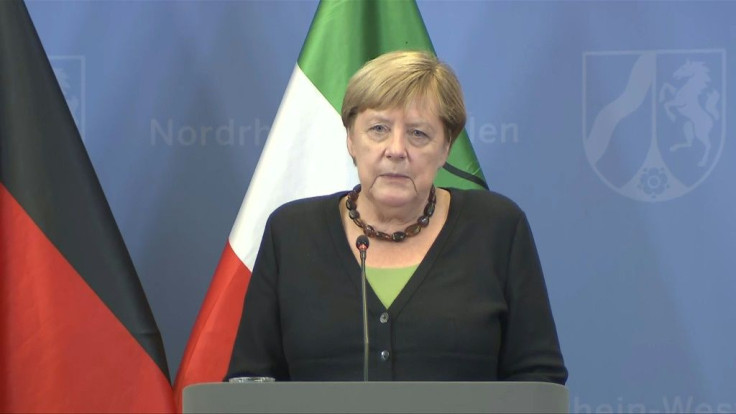 Merkel says talks with Taliban must continue
