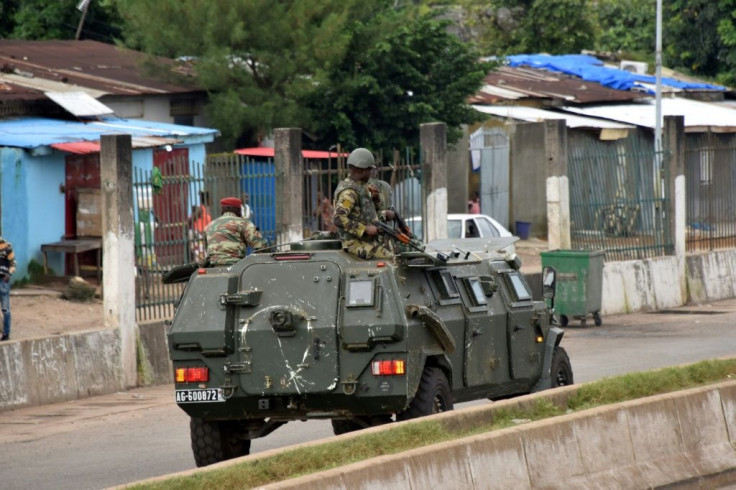 Troops were patrolling the streets of Conakry Sunday following the coup