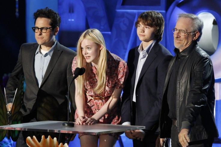 &quot;Super 8&quot; director JJ Abrams (L), stars Elle Fanning and Joel Courtney, and producer Steven Spielberg