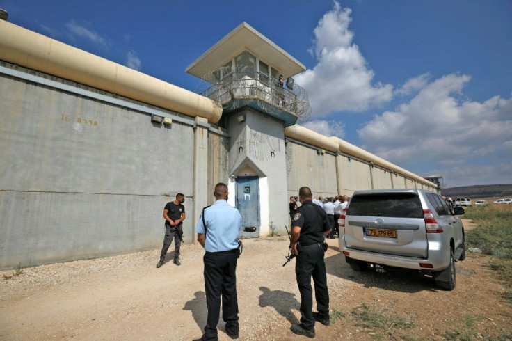 Israeli security personnel gather outside the Gilboa Prison in northern Israel