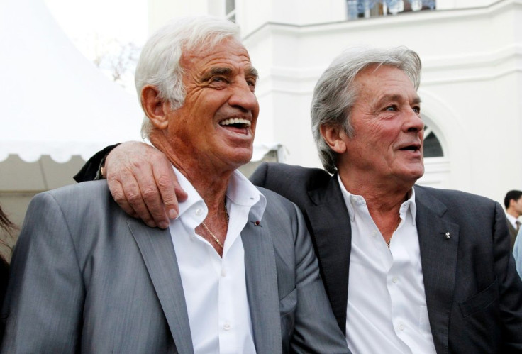 Alain Delon (r) said he was 'crushed' by the news of Belmondo's death