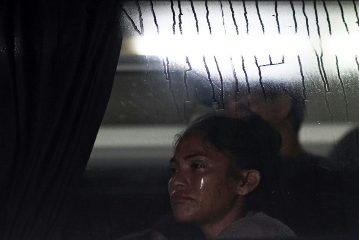 A migrant heading in a caravan to the US cries after being detained by Mexican migrations officers in Huixtla, Chiapas State, Mexico, on September 5, 2021