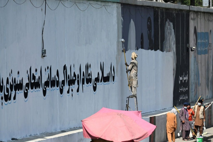 Within weeks of capturing Kabul, the Taliban have started replacing many of the city's murals with propaganda slogans