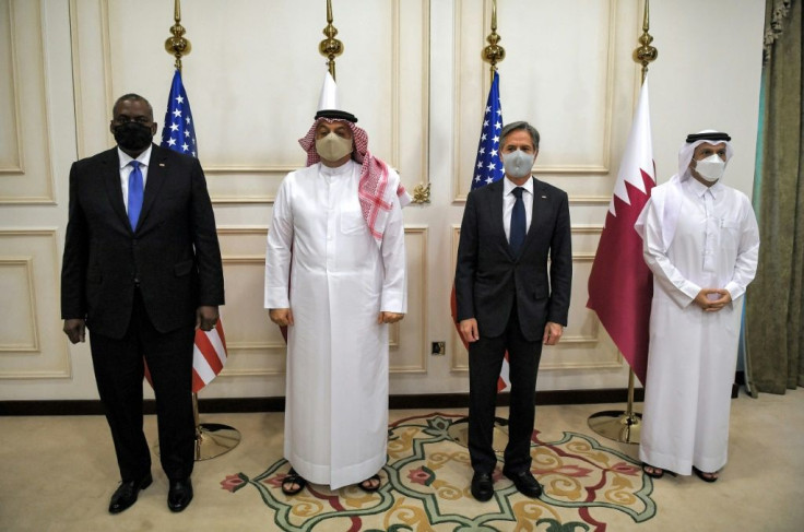 US Secretary of State Antony Blinken (2nd-R) and Secretary of Defense Lloyd Austin (L) with Qatari Deputy Prime Minister and Foreign Minister Mohammed bin Abdulrahman Al Thani (R) and Qatari Deputy Prime Minister and Defense Minister Dr. Khalid bin Mohamm