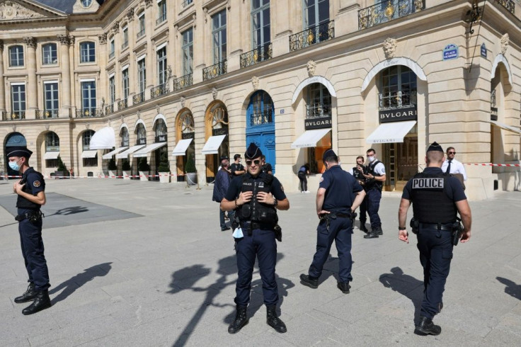 Police officers outside the Bulgari boutique on the Place Vendome in Paris on Tuesday.