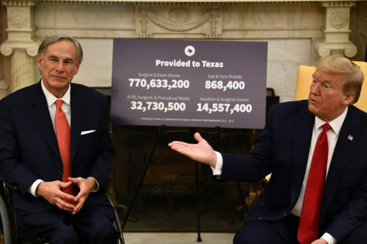 Texas Governor Greg Abbott, pictured (left) with then-president Donald Trump in May 2020, says the new law will make life 'harder for cheaters'