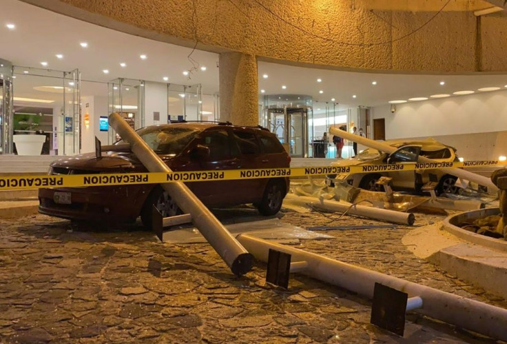 Damaged cars are seen outside a hotel in the Mexican resort city of Acapulco after a 7.1 magnitude earthquake