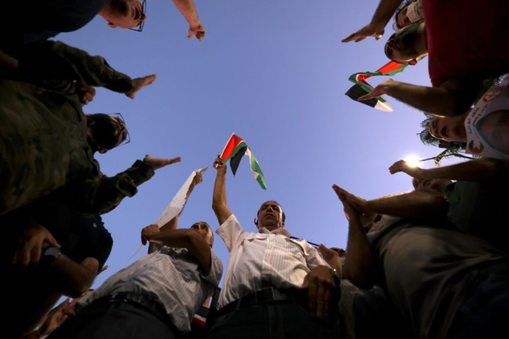 Palestinians demonstrate in support of Palestinian prisoners in Israeli jails, in the Israeli-occupied West Bank city of Ramallah on September 8, 2021