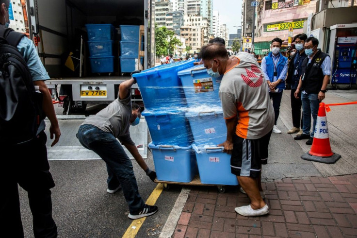 Police carted away dozens of boxes of items from the June 4 museum