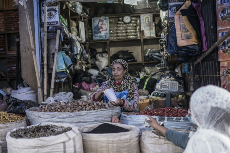At the capital's open-air Mercato market, a smattering of shoppers bought meat and spices for holiday meals