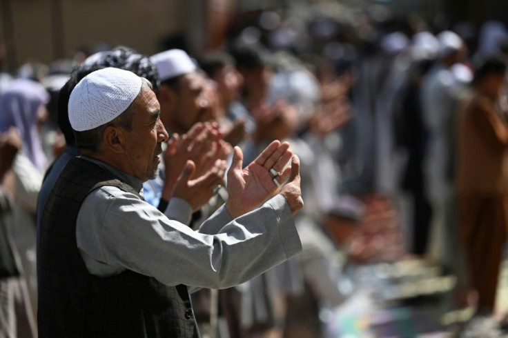 Members of the Hazara community take part in Friday prayers at a mosque on the outskirts of the Afghan capital Kabul on September 10, 2021