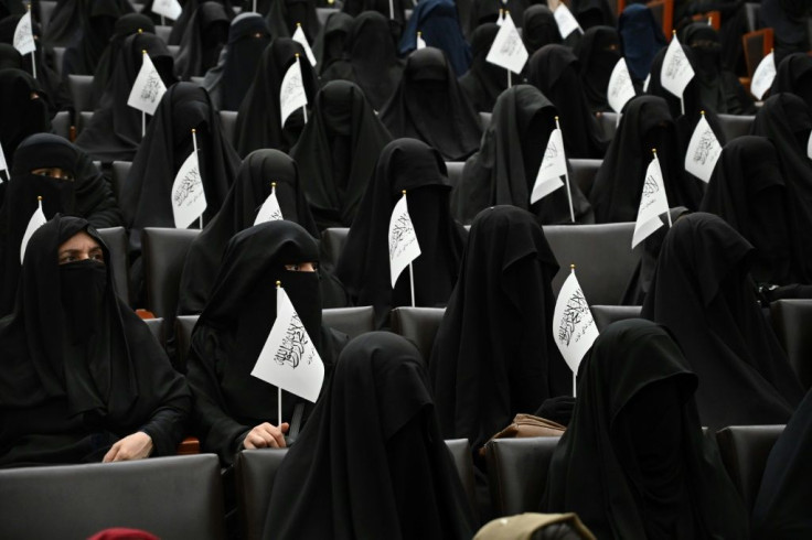 Around 300 women gathered in a lecture hall to hear speakers extol the virtues of Taliban rule, with dozens staging a rally on Kabul's streets afterwards