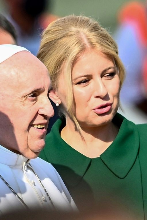 Pope Francis (L) was welcomed to Slovakia by President Zuzana Caputova