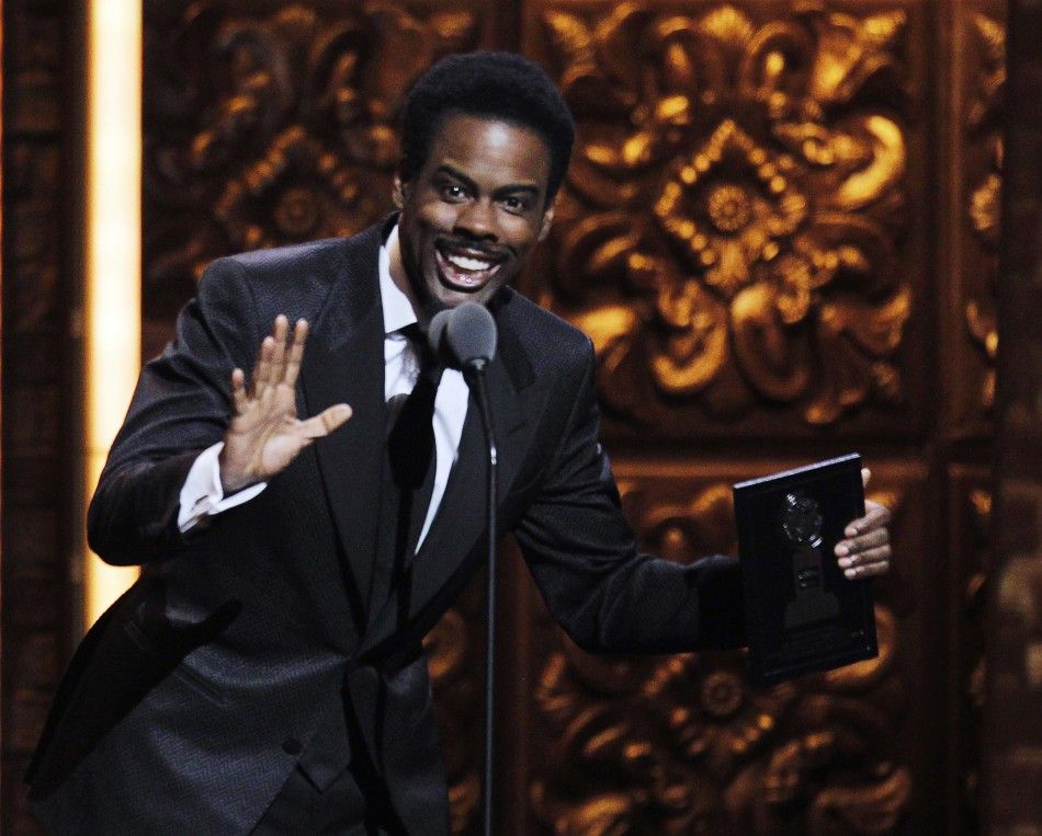 Chris Rock presents the award for best musical during the American Theatre Wings 65th annual Tony Awards ceremony in New York 