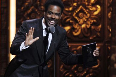 Chris Rock presents the award for best musical during the American Theatre Wing's 65th annual Tony Awards ceremony in New York 