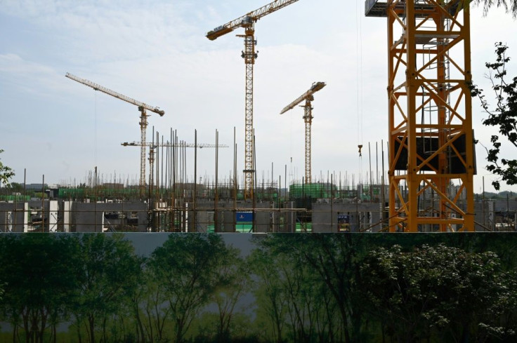 Cranes are seen at the construction site of an Evergrande housing complex in Beijing
