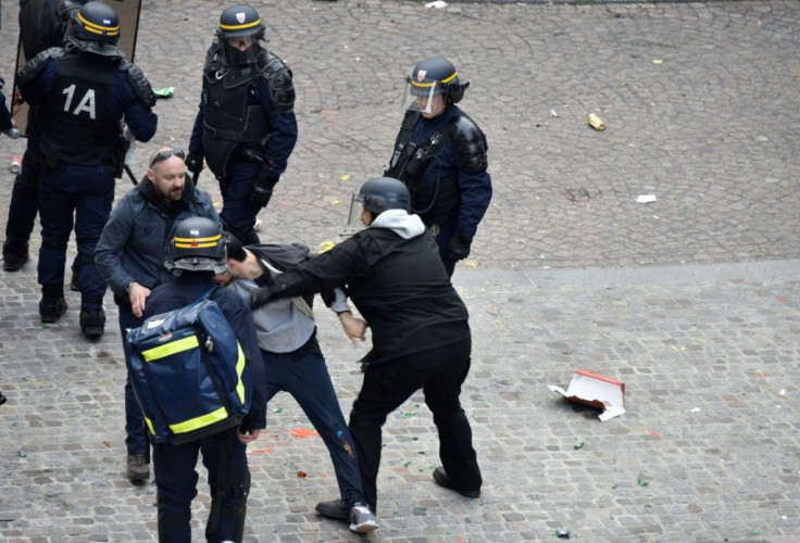 Alexandre Benalla, centre, during the protest in Paris on May 1, 2018.