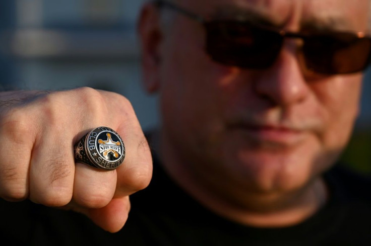 Loyal fan: Igor Troshchinsky shows off Sheriff club ring