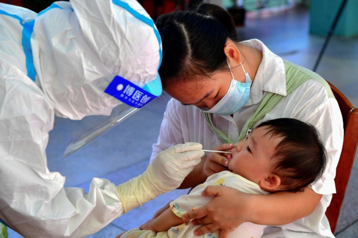 Southern Chinese cities closed schools and ordered testing for millions in a race to curb a new Covid-19 outbreak