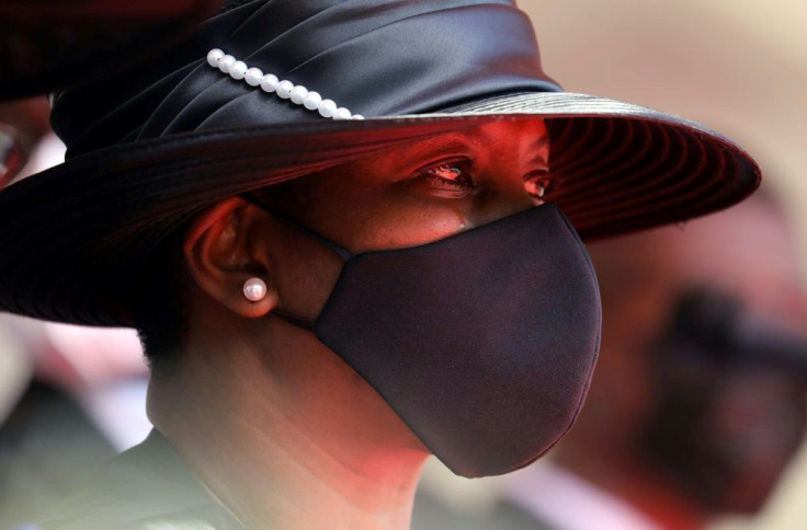 Martine Moise -- who was also shot by the gunmen who killed her husband, President Jovenel Moise, but survived -- grieves during his funeral on July 23, 2021, in Cap-Haitien, Haiti